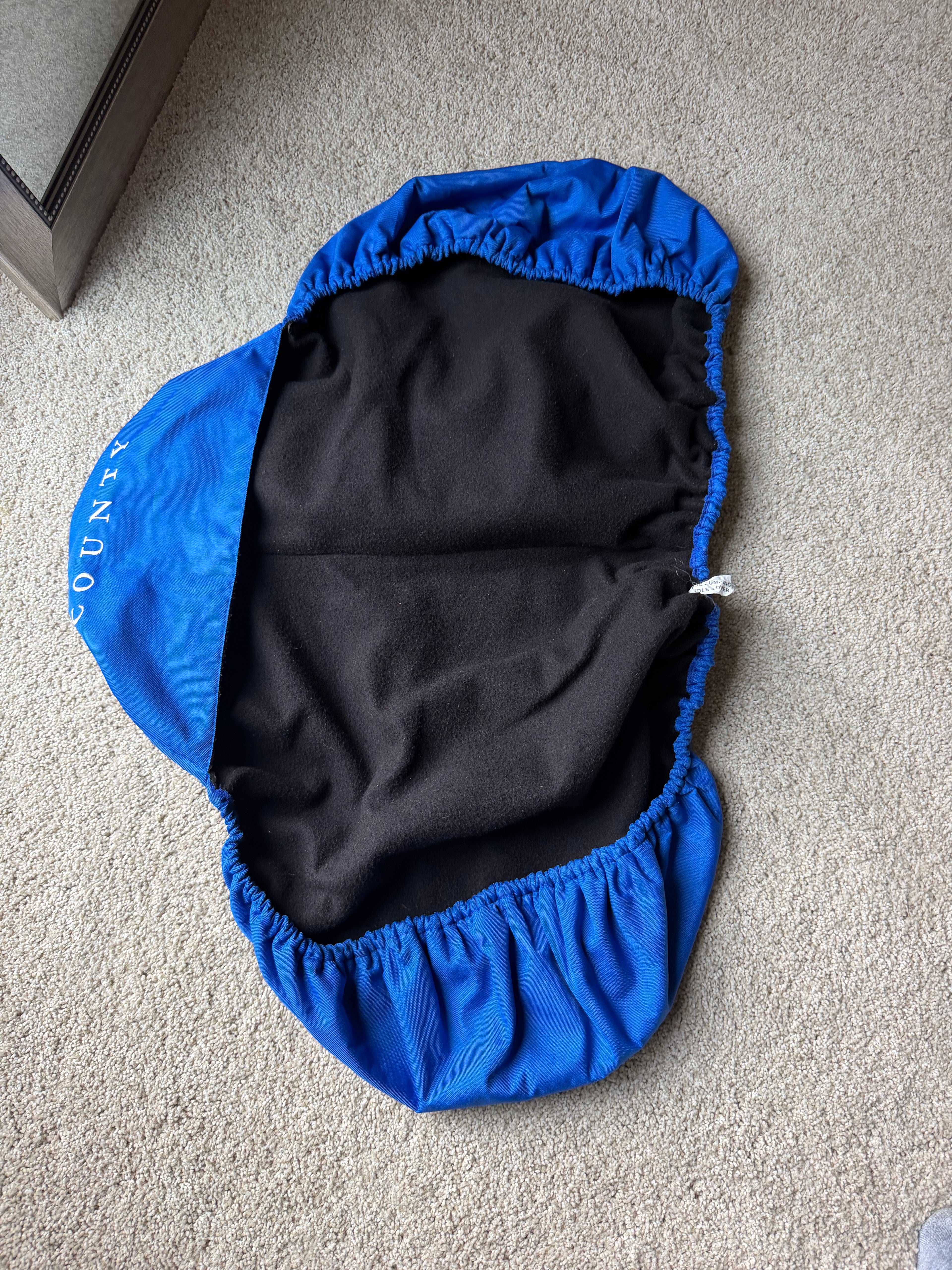 County Saddlery logo fleece lined cover
