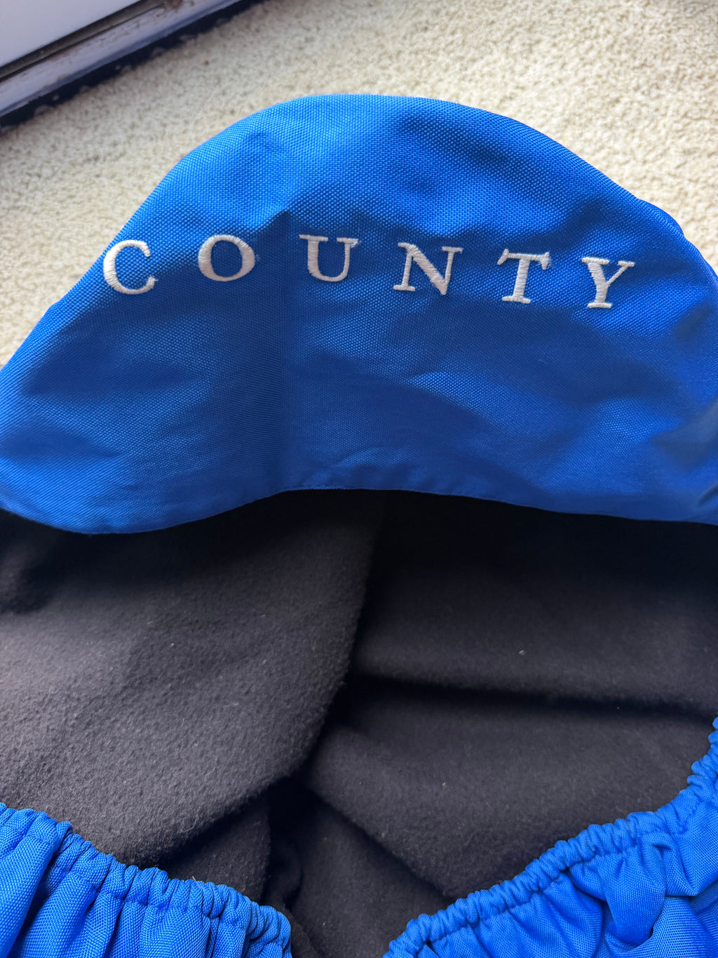 County Saddlery logo fleece lined cover