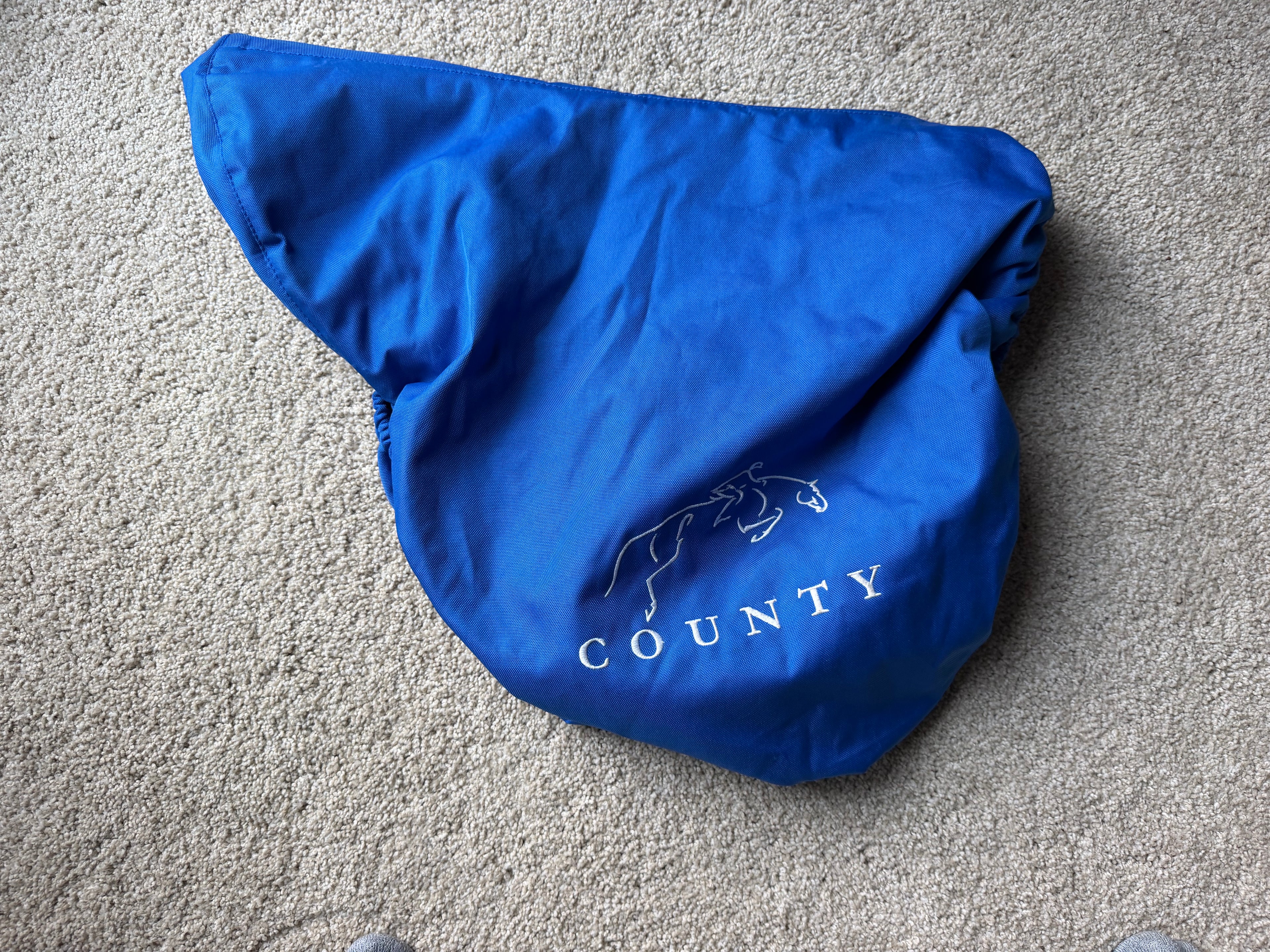 County Saddlery logo fleece lined cover