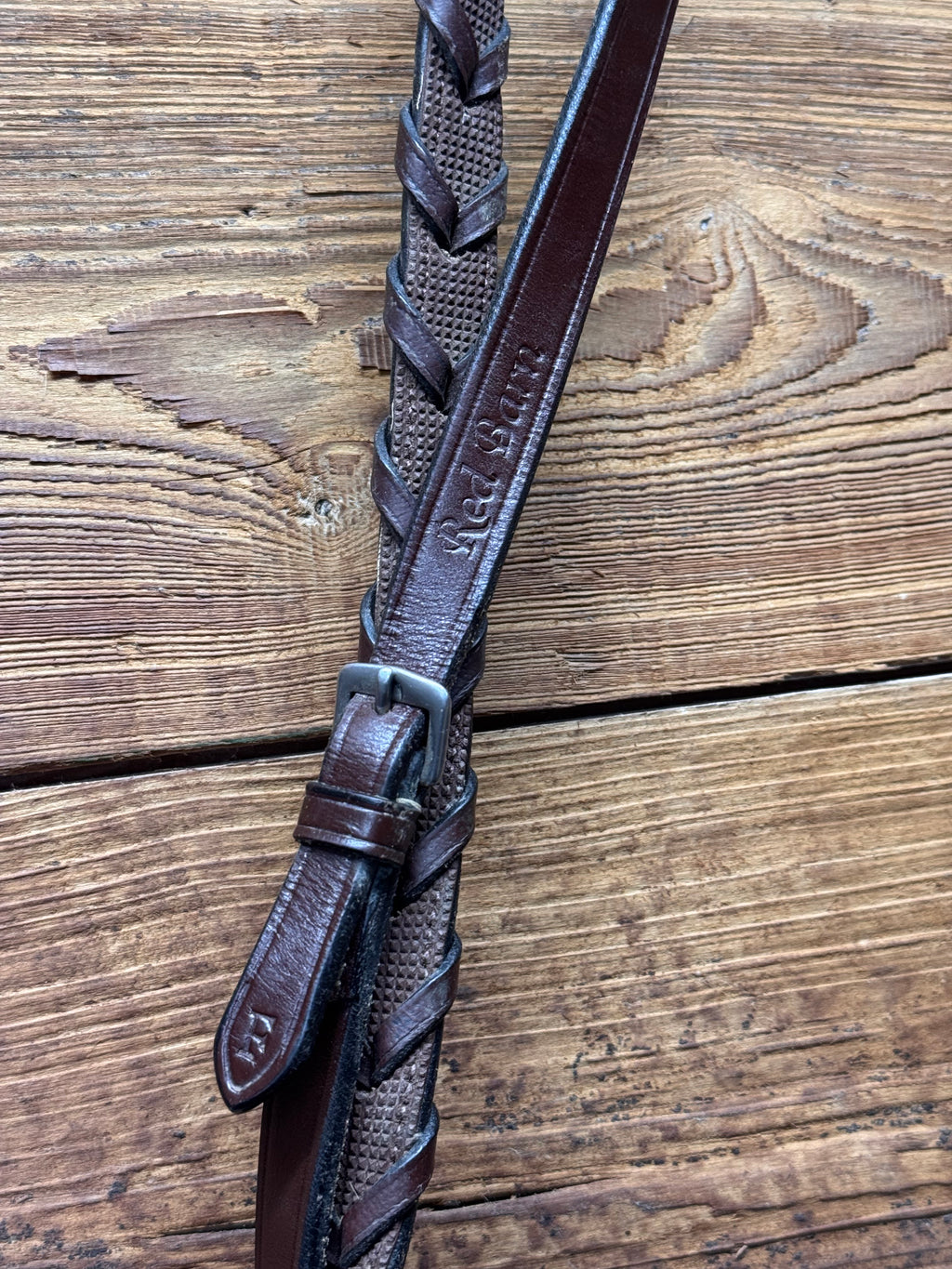 Used Red Barn rubber lined laced reins