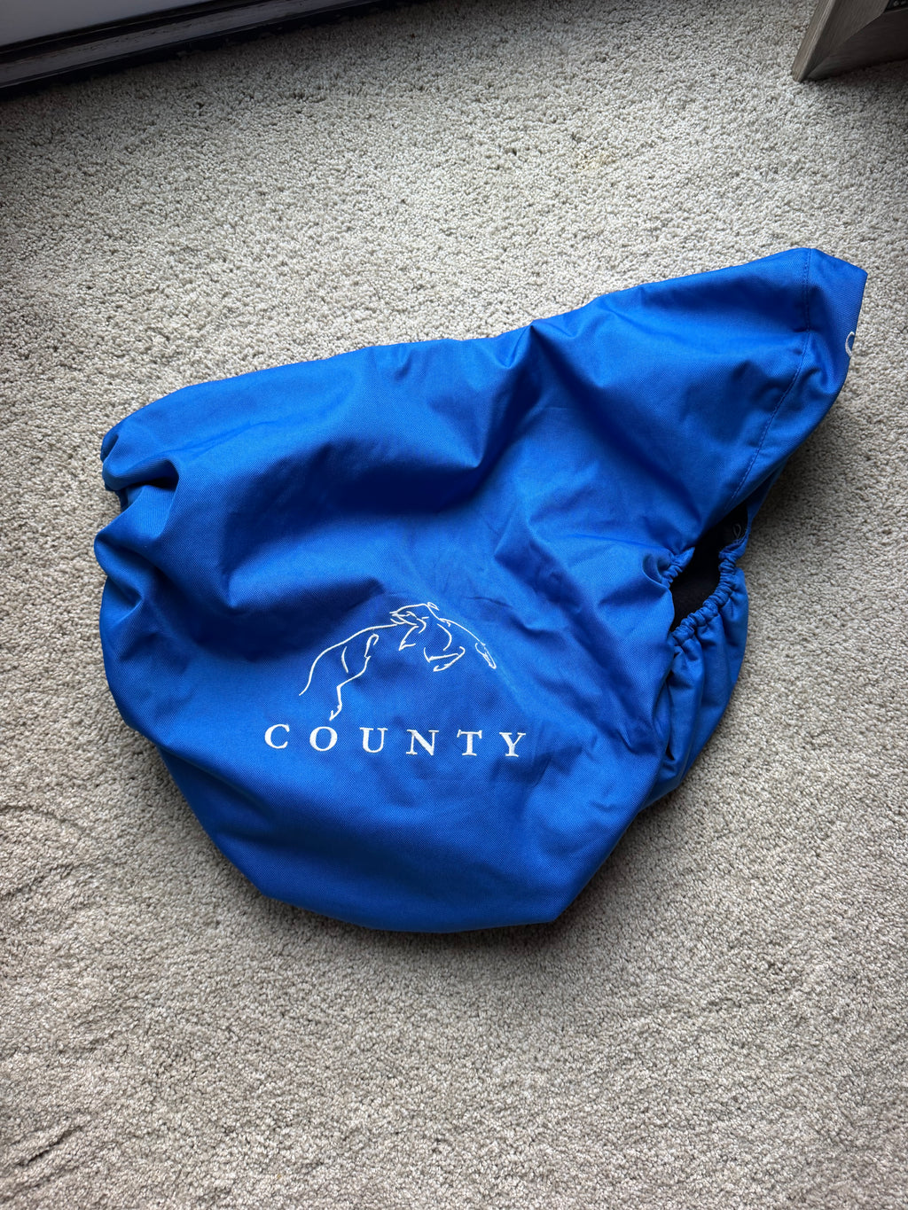 County Saddlery logo fleece lined cover