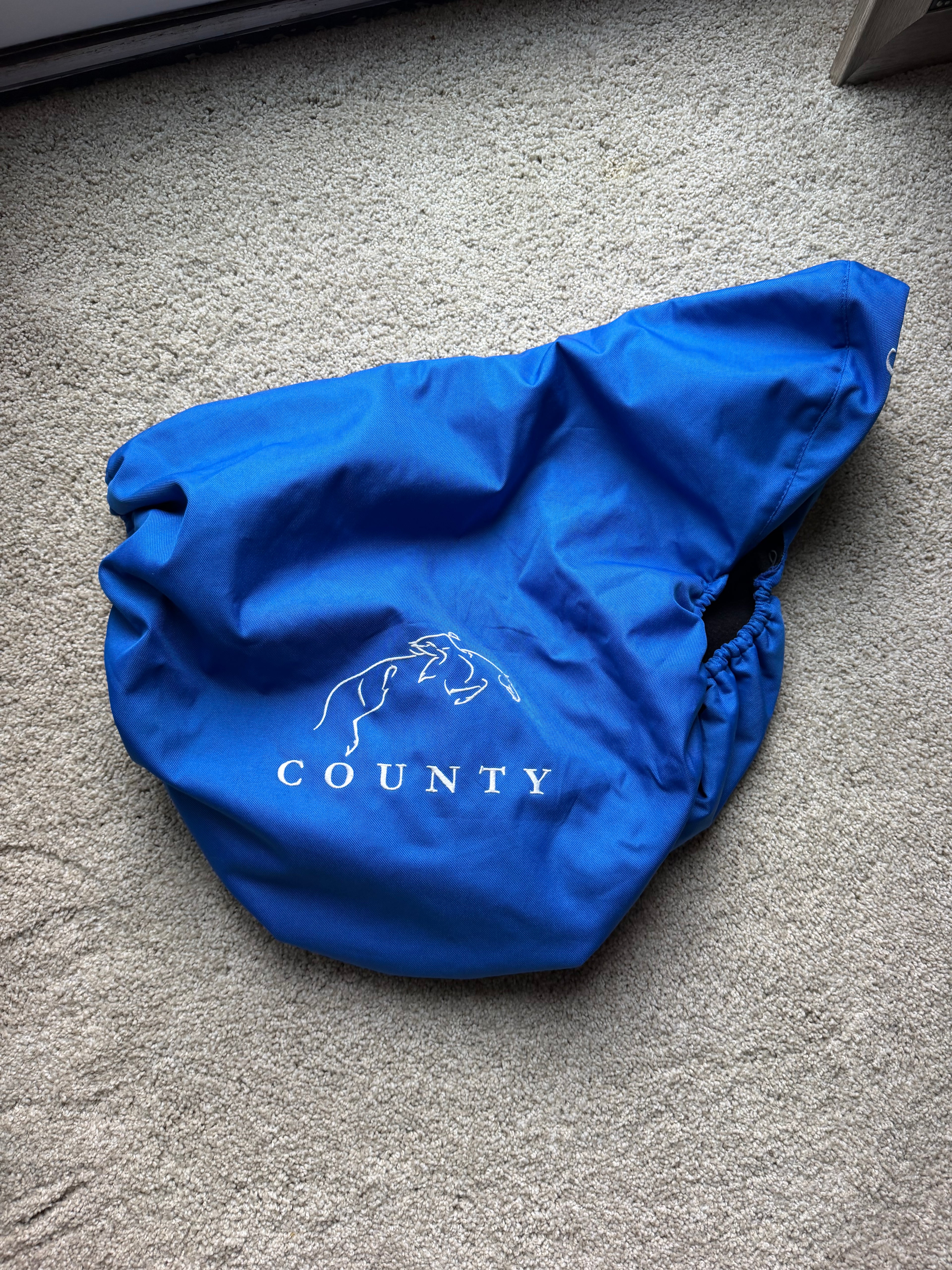 County Saddlery logo fleece lined cover