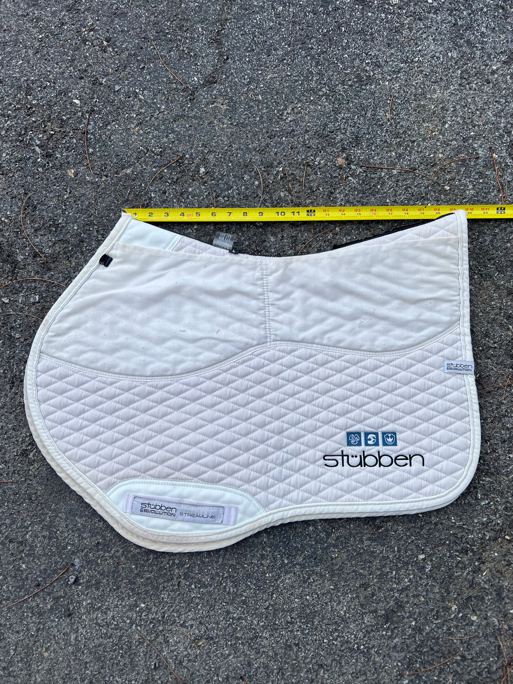 Stubben jumping pad with shim pockets