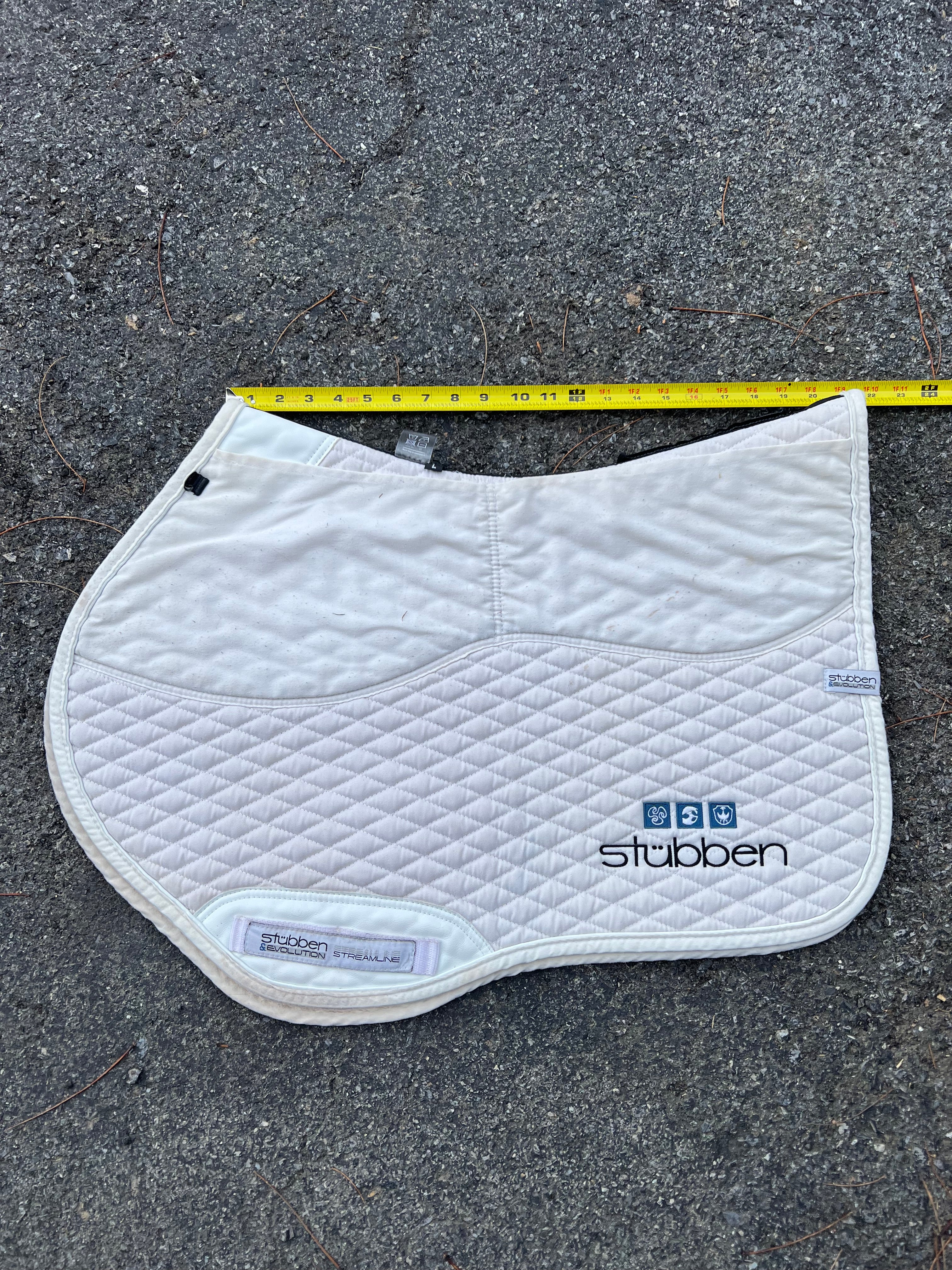 Stubben jumping pad with shim pockets