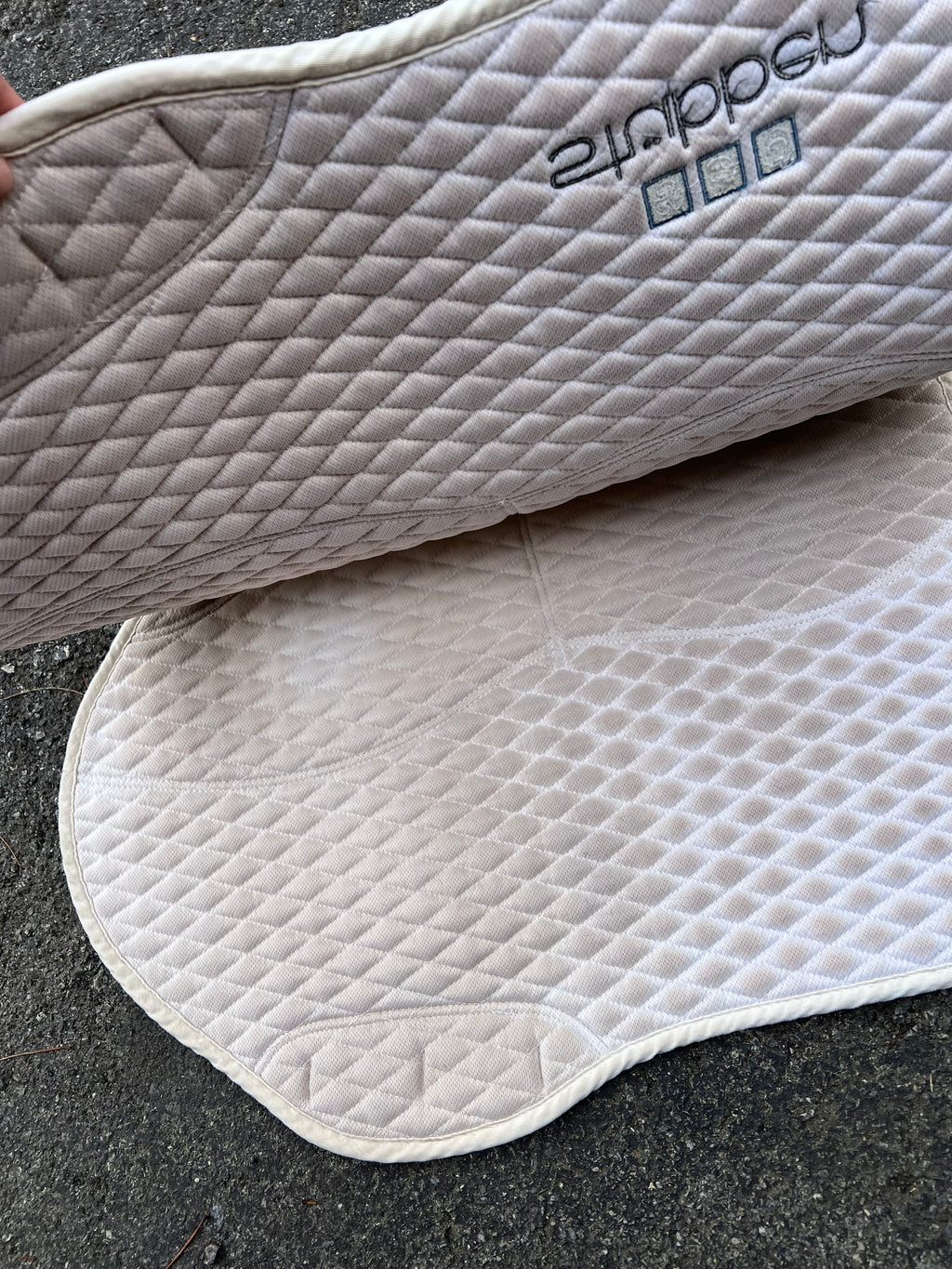 Stubben jumping pad with shim pockets